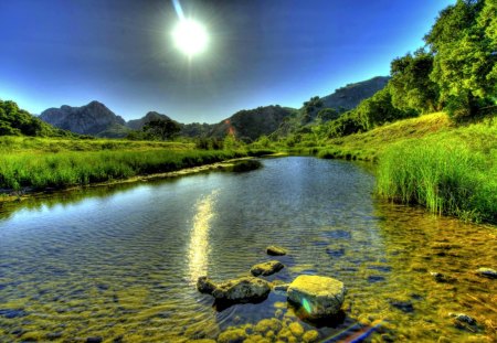 A PLEASANT VIEW - river, sunset, shallow, mountain, stones, sky