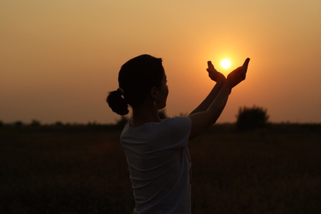 Girl holding the sun - sunset, orange, sun, beautiful