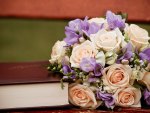 book & bouquet of roses