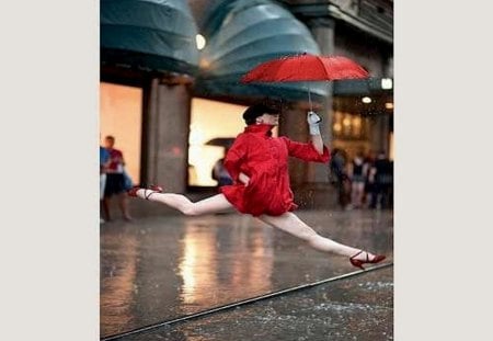 Dancing in the Rain - woman, dance, rain, ballet, leap, unique, red, umbrella, city