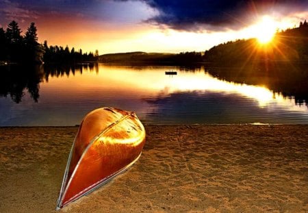 Upturned canoe at sunset - sky, beach, dazzling, sundown, trees, peaceful, water, sunset, sun rays, reflection, clouds, golden, abandoned, sand, boat, lake, mountain, summer, shore, nature, glow, lonely, beautiful, island, canoe, upturned, sea