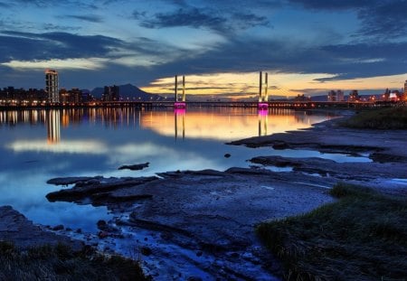 Lovely View - blue, rivers, skyline, splendor, sunrise, city lights, sunsets, reflection, view, skyscrapers, sky, clouds, bridges, water, beautiful, sea, city, beauty, lovely, architecture, ocean, buildings, river, nature, sunset, lights, dusk, lakes, new york, peaceful, bridge, building