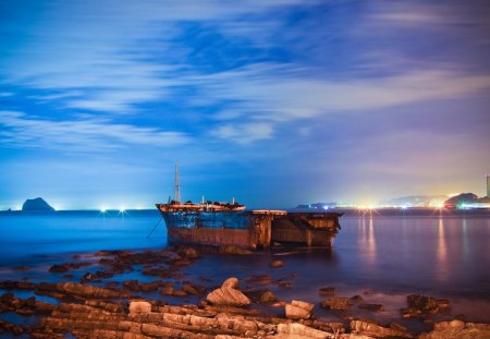 A Wrecked Boat in the Ocean