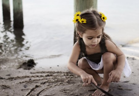 Cute yellow flower - hands, adorable, water, child, face, yellow, childhood, baby, sweet, flowers, little girl, sand, cute