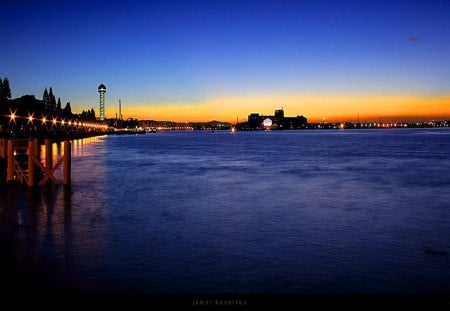 Wharf inside the sea - inside, brillant sun, blue sea, wharf, lights, sunrise, city, houses