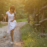 Girl walking in the woods