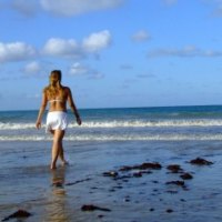 girl walking on the beach