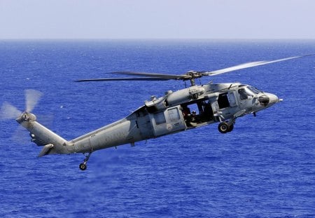 knighthawk mh-60s - hovers low, close up, ocean