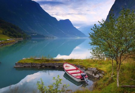 A Boat in the Blue Lake - scenery, rivers, amazing, photo, reflection, surface, mountains lake, mirror, landscapes, plants, beautiful place, nice, sky, b oats, clouds, trees, beautiful, photography, beauty, cool, blue lake, reflex, natural, mounts, nature, awesome, shadows, lakes, mountains