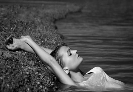 in the warmth of the sun - relax, summer, woman, beautiful, black and white, think, seaside, love