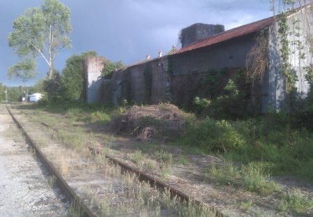 Another Small Town Dying - storm, empty, tracks, warehouse