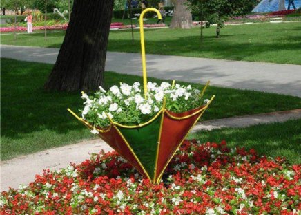 Summer Use for Your Umbrella! - flower bed, creative, garden, umbrella