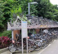 Two-tier bike shed on the sidewalk