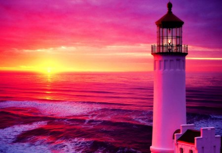 Lighthouse at sunset - sky, sunshine, beach, sundown, sun, water, colorful, sunset, purple, glowing, clouds, rays, ocean, lighthouse, sunlight, shore, waves, nature, glow, sunrise, sea