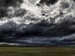 storm clouds over fields