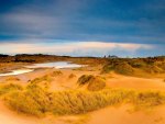 pools in grassy dunes