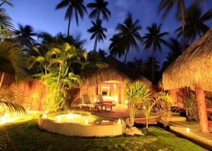 Night over Bora Bora - relax, summer, romantic, cabin, beach, pearl garden, holiday, exotic, palm trees, hotel, place, hut, sky, palms, beautiful, rest, tropics, nature, tropical, bora bora, pool, lights, destination, cottages, dusk, bingalows