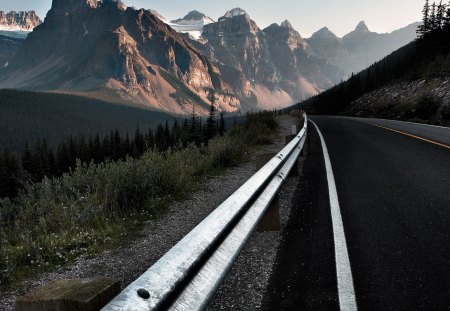 highway to an impressive mountain range - highway, valley, forest, mountains