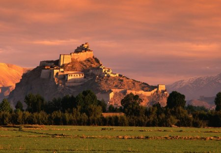 hilltop castle under a pink sky - hill, pink sky, fields, mountains, castle