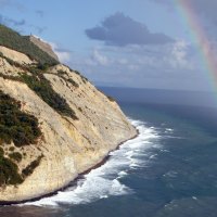 Rainbow over the waves