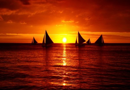 Glowing sunset - nice, sky, sundown, sun, water, sunset, fire, amazing, glowing, reflection, clouds, orange, ocean, lake, sail, boats, sailing, lovely, waves, nature, glow, fiery, red, beautiful, sailboat, sunrise, sea