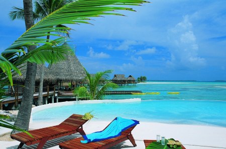 Just Relax - swimming pool, beauty, sky, hat, paradise, peaceful, water, chairs, amazing, view, clouds, summer time, holiday, house, resort, relax, ocean, houses, swimming, palms, summer, tropical, palm, lovely, exotic, nature, chair, blue, beautiful, splendor, pool, sea