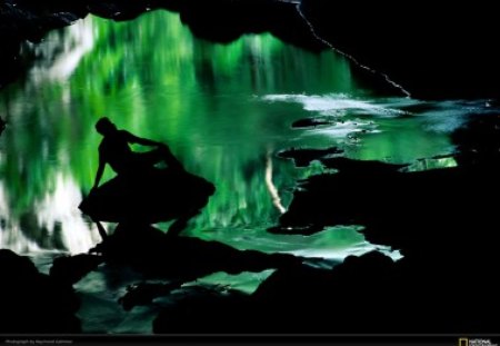 green pool - green pool, man in cave entrence