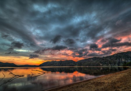 Sunset - ature, beautiful, beach, amazing, ocean, view, footprints, sunset, colorful, mountains, water, landscape, beauty, peaceful, shore, wood, lake, sky, sand, reflection, clouds, lovely, splendor, sea, colors