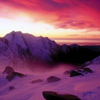 sunset over franz josef glacier new zealand
