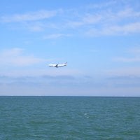 Airplane over the Ocean