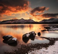 Red Sky at Sunset over Frosty Mountains