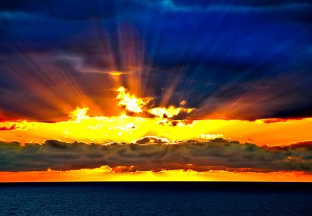 Sunset on the Horizon - sun rays, scenery, scene, sunrise, ripples, sunrays, widescreen, nice, amber, line, oceanscape, beauty, gold, nature, picture, seascape, waterscape, horizon, blue, amazing, sunsets, surface, view, golden, sky, sun, clouds, oceans, water, image, beautiful, photography, photoshop, sea, scenic, cool, ambar, awesome, panorama