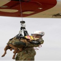 Aircraftwoman Samantha Vassallo and Military Working dog â€˜Allyâ€™