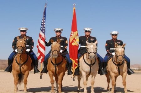 Marines on horse back