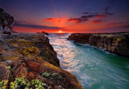 Heaven's gate - sky, sundown, sun, colorful, sunset, rocks, clouds, ocean, gate, summer, shore, heaven, nature, red, flowers, sea, sunrise