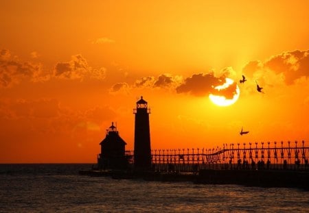 lighthouse enveloped by sunset - lighthouse, pier, sunset, sea, birds