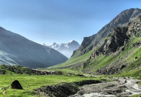 magnificent landscape - mountains, mist, valley, grass