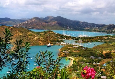 Travell to the Caribbean - tropics, port, view, holiday, sunny, lake, boats, mountain, tropical, caribbean, nature, trip, pier, beautiful, rest, sea, nice, sky, beach, water, ships, clouds, houses, summer, lovely, village, exoric, town, travell, blue, island, flowers, destination