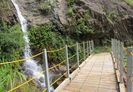 Waterfalls - waterfalls, mountain climbing, rock, grass, bridge