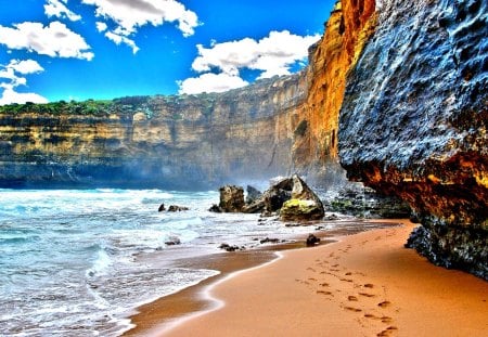 ROCKY COAST - clouds, water, landscape, sea, sand, nature, footprints, mountains, sky, rocks