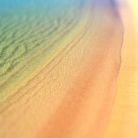 Ocean Ripples over Sandy Beach