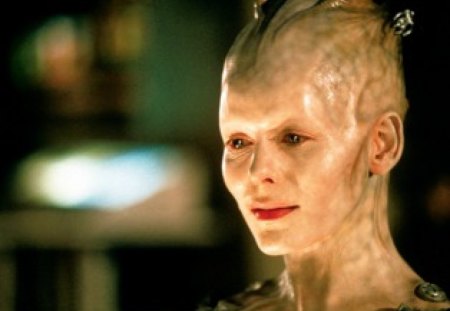 star trek:borg queen - cyborg, smiling, bald, woman