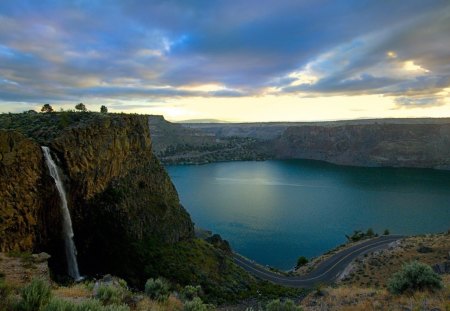 Waterfall In The Rockies - water, road, grass, mountain, nature, waterfall, cliff, lake, sky, canyon, wildlife