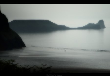 Walking the Worm - shoreline, beach, sky, water, dream, darking, alone, lonely, evening, walk, blue, wales, island, sea