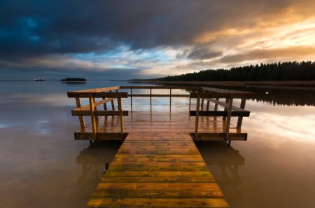 wooden pier in varmland sweeden - clouds, sunset, lake, forest, pier