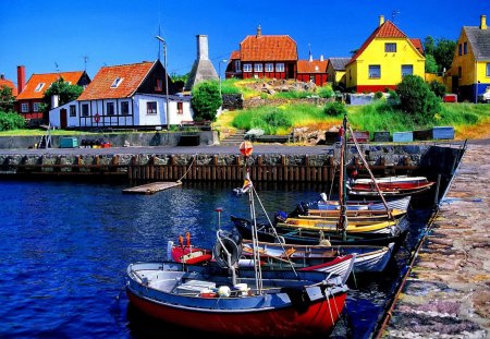 Countryside paradise - pretty, town, blue, calmness, countryside, shore, riverbank, port, lake, paradise, nice, houses, sky, water, beautiful, lovely, stones, pier, village, boats, colorful, river, nature, serenity, peaceful