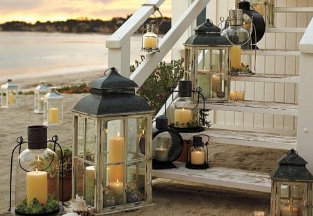 Light the way - lights, lanterns, beautiful, beach, candles, yellow, wood, stairs, fire, sand, white, flames, lantern, steps, shells