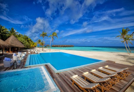 Luxury resort - relax, horizons, blue, cabin, beach, shore, swimming, holiday, bungalow, exotic, nice, hut, cottage, clouds, luxury, palms, aky, water, beautiful, sea, resort, lovely, ocean, rest, sunbed, nature, pool, bright, clear