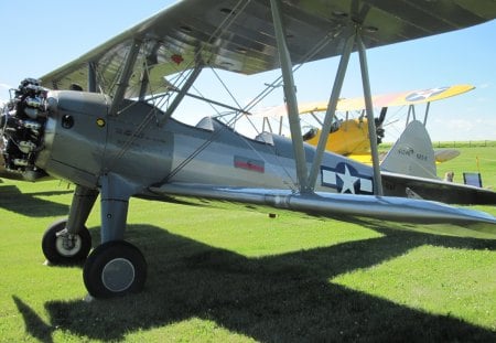 Airplane at the air show in Alberta 22 - airplane, black, silver, green, Military, grass, wheels