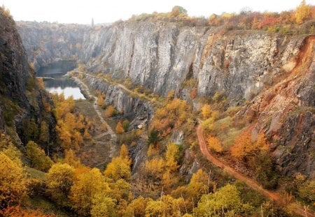 old abandoned quarry - pool, road, cliffs, quarry